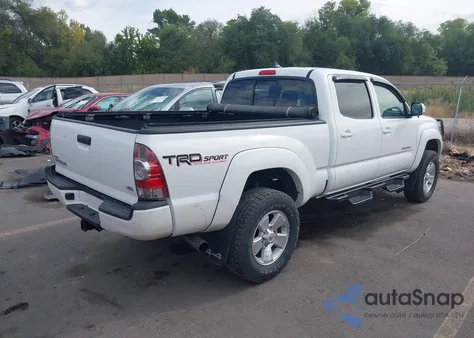 2015 Toyota Tacoma Base V6 z USA, uszkodzony, nr VIN 3TMMU4FN0FM083581
